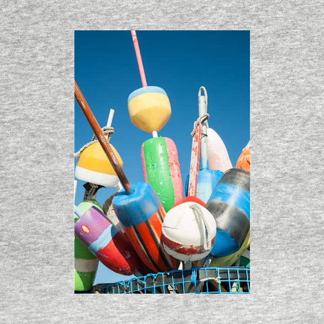 Collection of colorful fishing or lobster trap buoys and markers at wharf in Provincetown, Massachusetts, USA  Looks great on a sticker and even better as a canvas print on your wall. by brians101